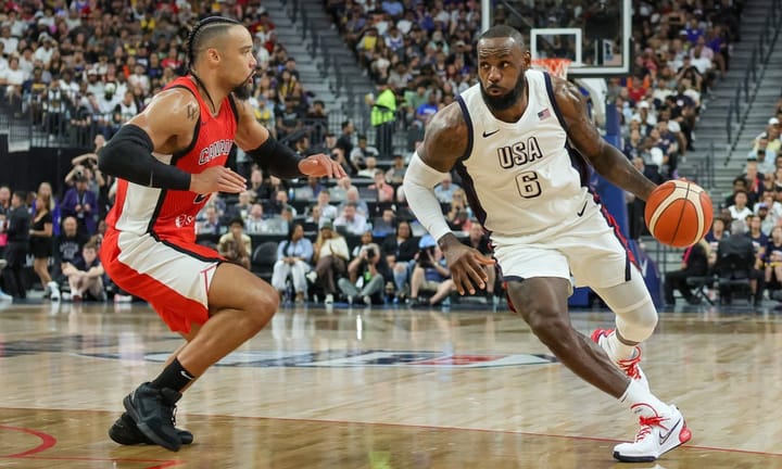 Obama observes as USA Basketball secures victory over Canada during preliminary game in Paris while he remains in Las Vegas.