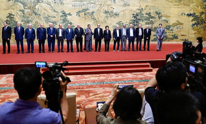 Palestinian groups reach consensus on halting splits following dialogues in China.