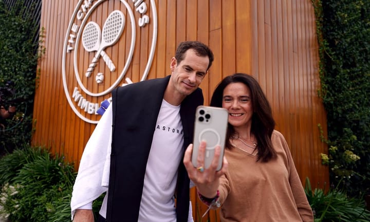 Live Update: Wimbledon 2024 sees rain delay commence; Rafael Nadal and Emma Radical debut in men's and women's doubles matches respectively.