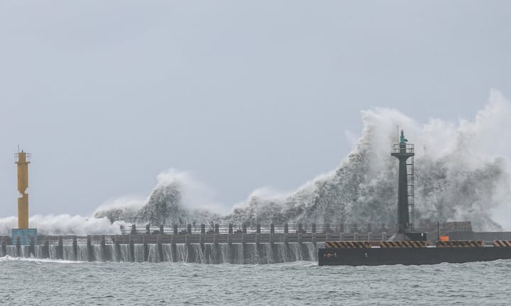 Typhoon Gaemi claims lives in Taiwan amidst deluge and robust gusts.
