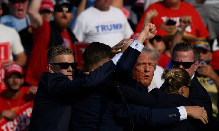 Global leaders express strong disapproval over recent incidents at Donald Trump rally involving gunfire.