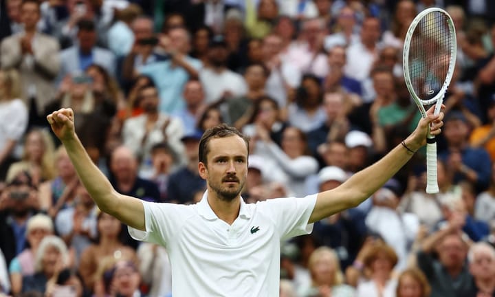 Medvedev defeats top-ranked Djokovic with a surprisingly long, five-set match at Wimbledon.
