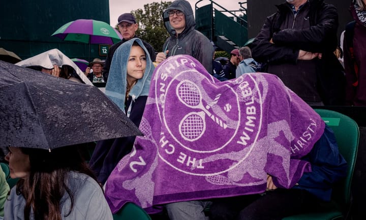 Capturing the Essence of Wimbledon 2024 Day: A Visual Journey Through Rain-Delayed Matches