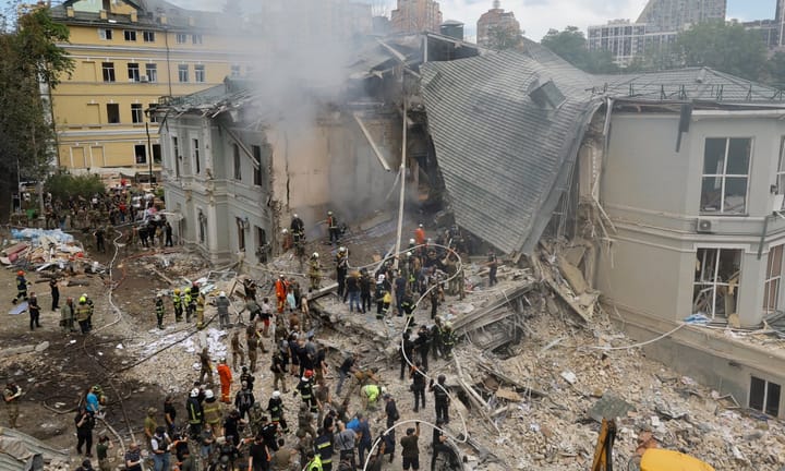 Searching for survivors amidst destroyed Kyiv children's hospital following fatalities from Russia's missile assault on Ukraine, with over 29 lives lost.