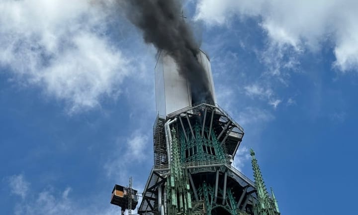 Cathedral's Spire Engulfed by Flames at Rouen, France's Historical Gem in Normandy