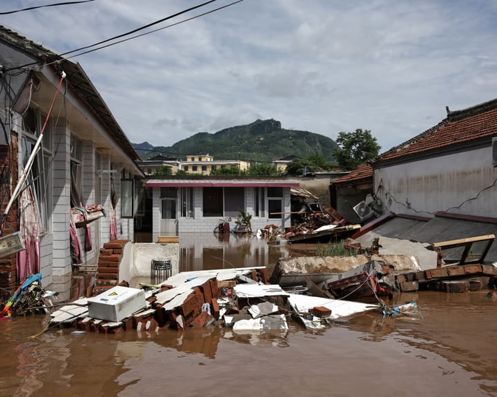 "Beijing flood survivors tally losses amid scant government aid"
