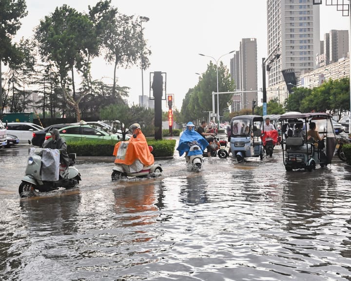 "Heavy rains flood northern China, killing two and forcing thousands to flee"