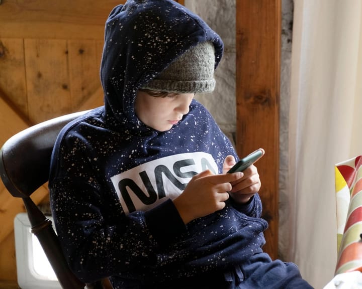 "Kids cutting smartphone time to boost mental well-being, study shows"