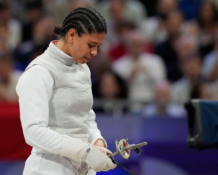 "French fencer's doping charge dismissed after kissing boyfriend defense"