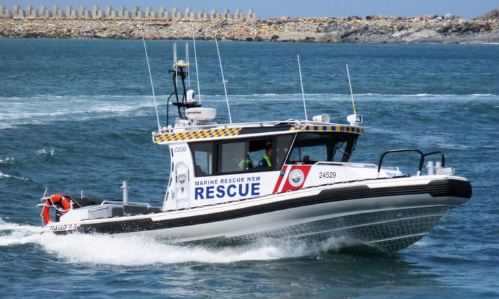 "Missing teen surfer discovered on island 14km from Wooli Beach after search"