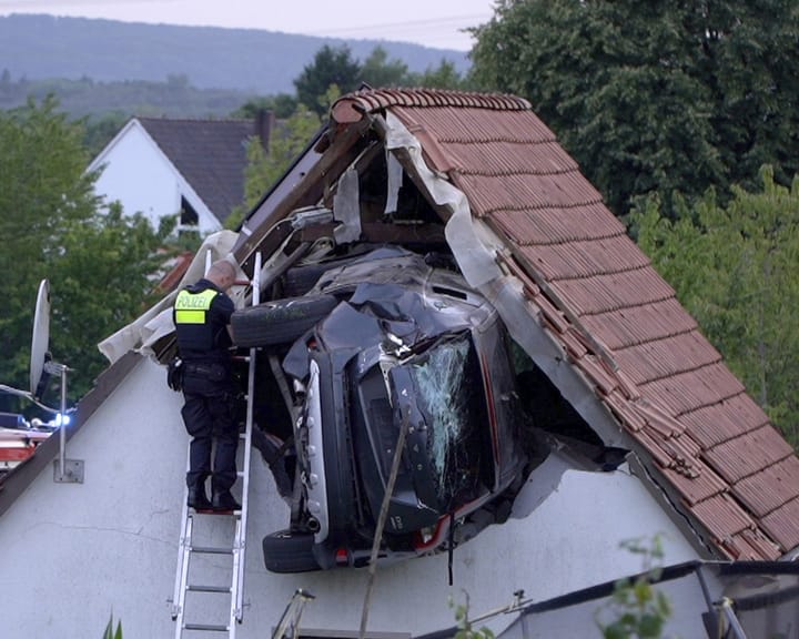 "Two severely hurt after car slams into German barn roof"