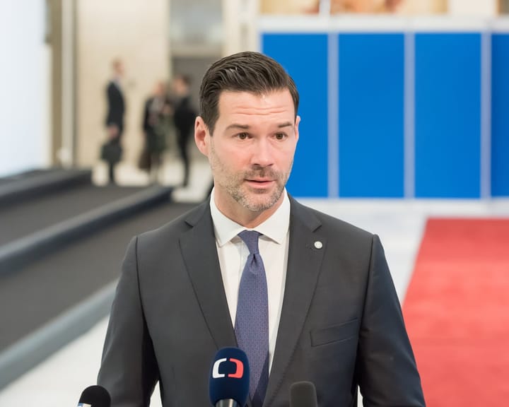 Sweden's migration minister stunned by son's involvement in far-right activities