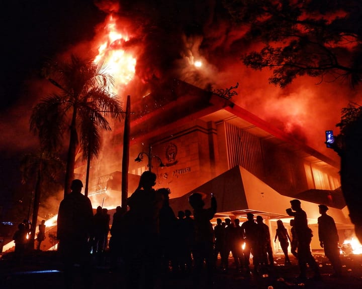 "Three dead in Indonesia fire as protesters riot over driver's death"