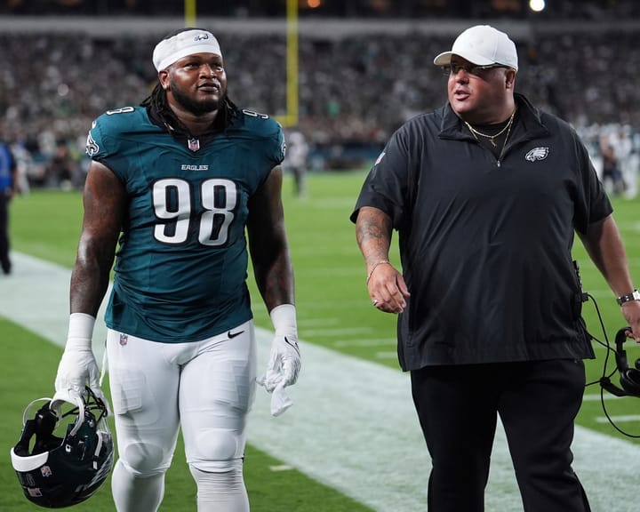 "Eagles edge Cowboys after Carter ejected for spitting on Prescott at kickoff"