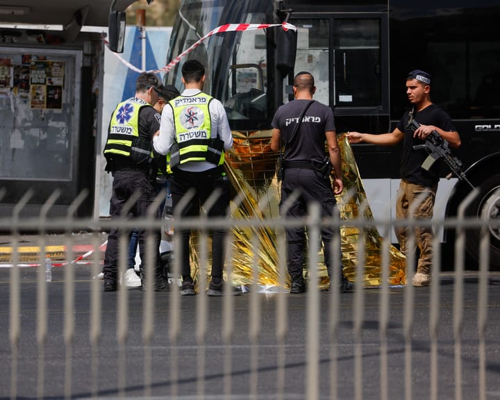 Gunmen kill six at Jerusalem bus stop in attack by Palestinians