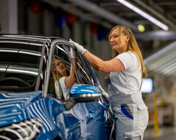 "VW halts output at two factories amid sluggish EV demand"