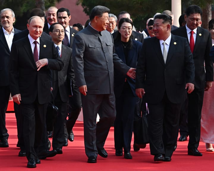"Xi Jinping warns of global 'peace or war' choice as Putin and Kim attend military event"