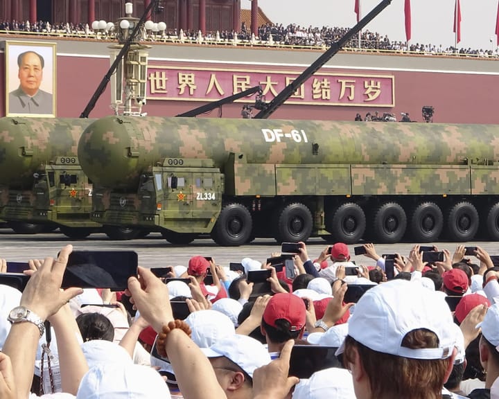 "Robotic wolves and nuclear arsenal on display at Chinese military parade"