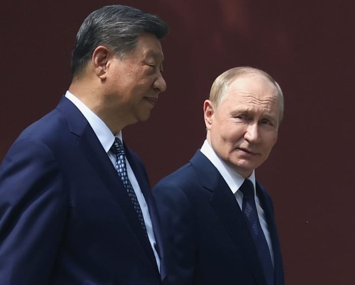 "Putin praises China relations as Kim Jong-un visits Beijing before parade"