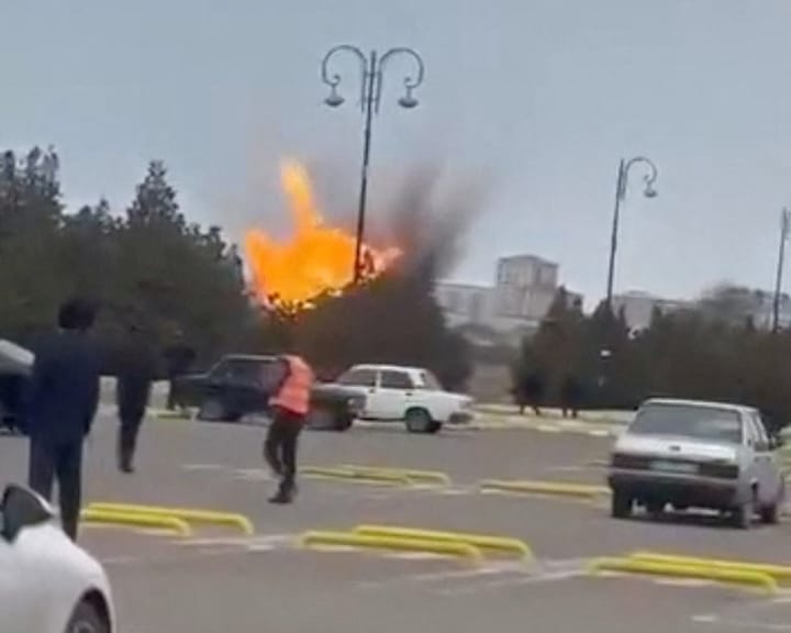 Azerbaijan blames Iran for drone strike on airport, injuring two.