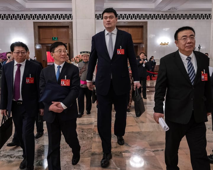 Why does former 7‑ft‑6‑in basketball star Yao Ming attend China's Two Sessions?