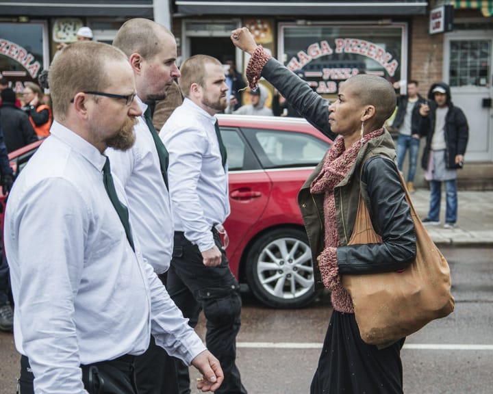 Ten years later: a solitary Black woman stands defiant against Swedish neo‑Nazis