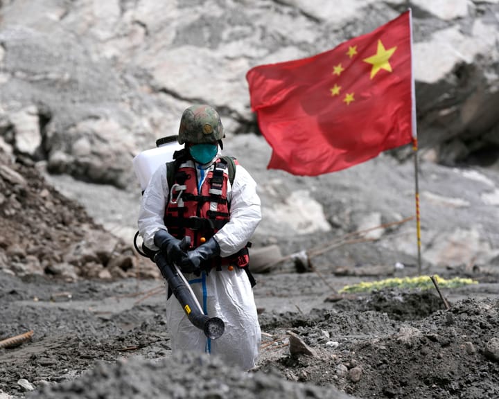 Families in flood-ravaged Tibet search for the missing amid China's silence as the world looks away